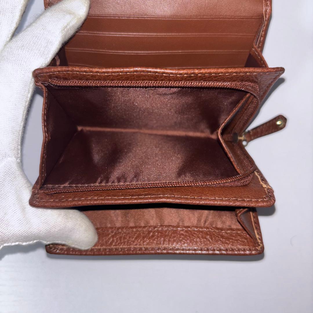 0077 新品、未使用 COACH レザー 金馬車ロゴ 折り財布