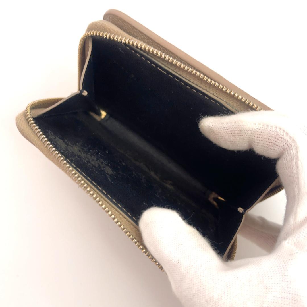 YSL イヴ・サンローラン ベージュ レザー 二つ折り財布 ラウンドジップ