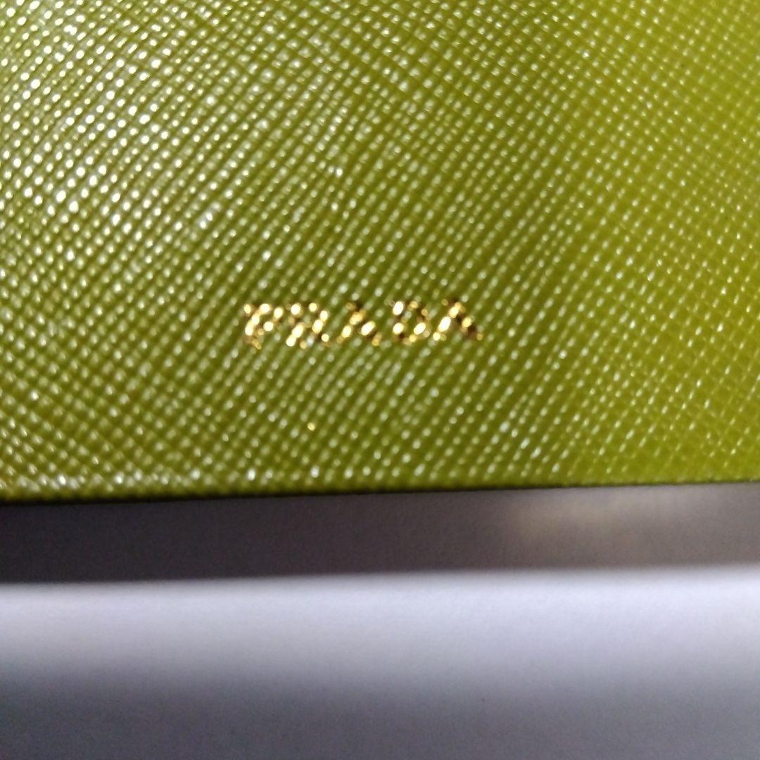 PRADA ブラック 三つ折り財布　三角ロゴプレート　おまけ付き(アドレス帳)