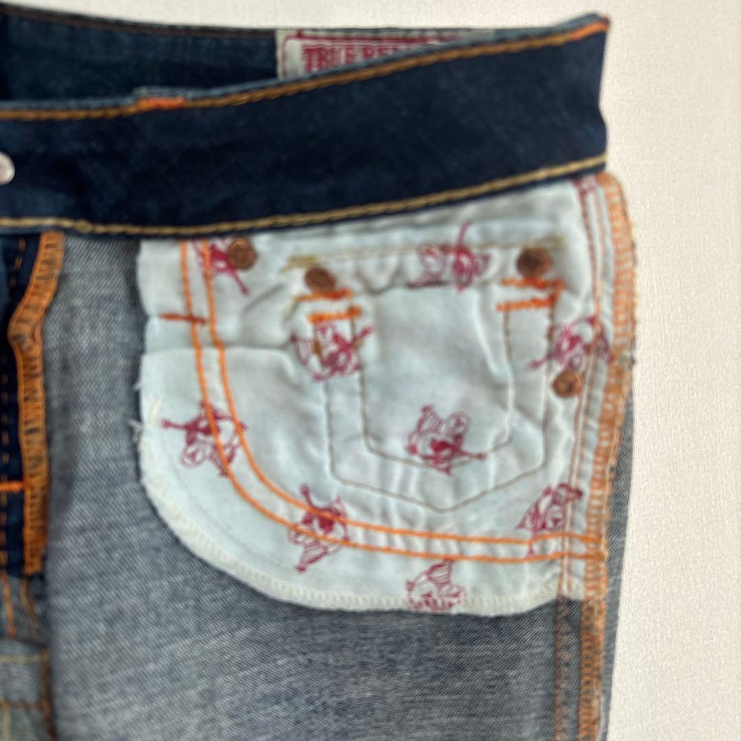 a336【TRUE RELIGION】レディース　26 ブーツカット　ダメージ