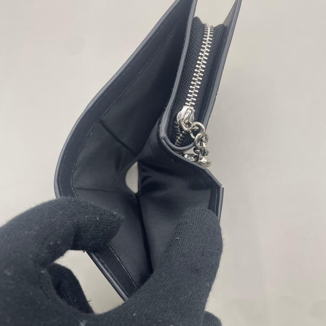 極美品✨️ コーチ 二つ折り財布 スヌーピー シグネチャー PVC レザー 茶