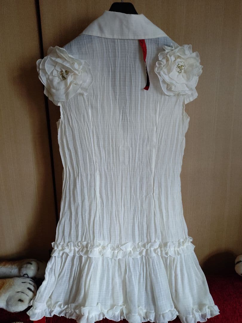 新品 未使用 ノコ オーノ フリルプリーツアイボリー ノースリーブジャケット