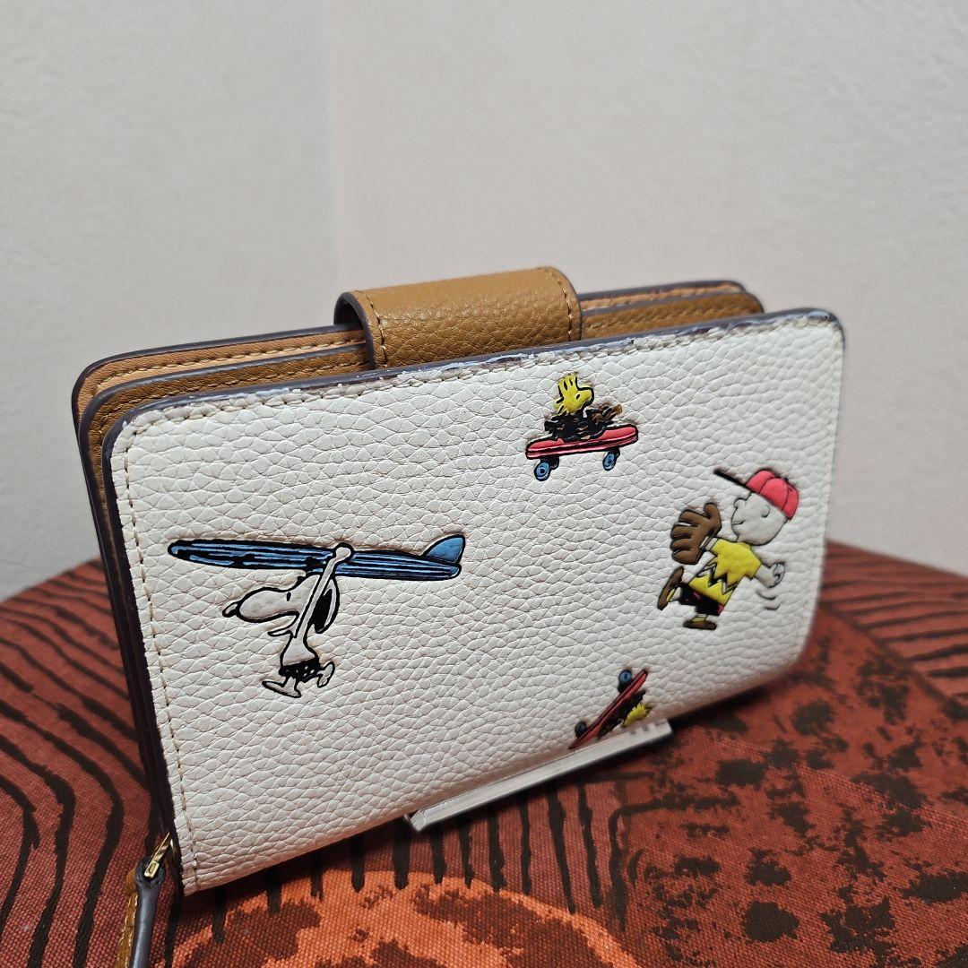 COACH コーチ 二つ折り 短財布 スヌーピー PEANUTS C4899