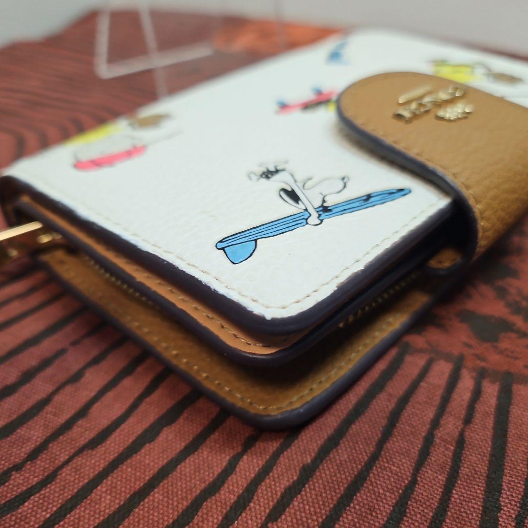 COACH コーチ 二つ折り 短財布 スヌーピー PEANUTS C4899
