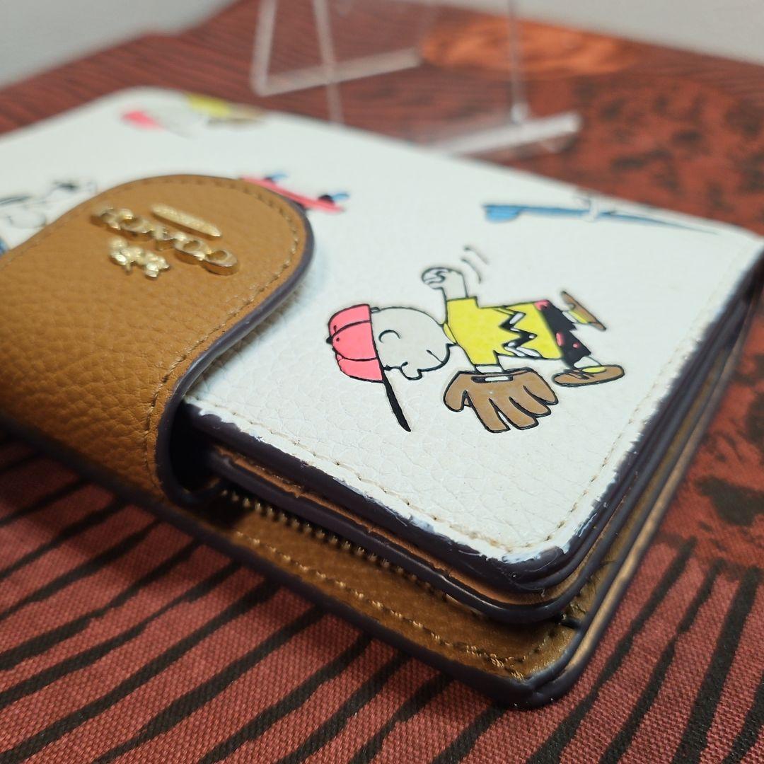 COACH コーチ 二つ折り 短財布 スヌーピー PEANUTS C4899
