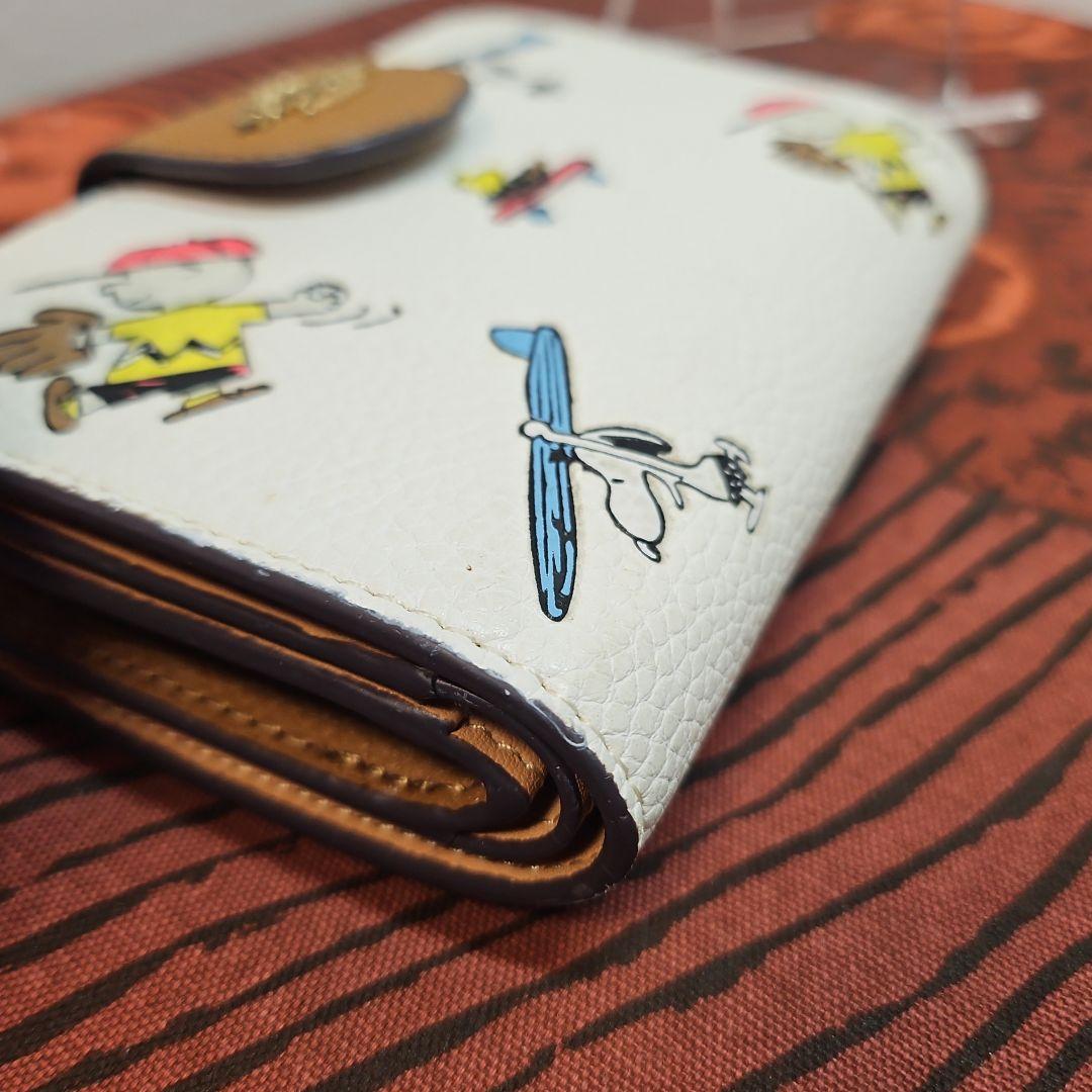 COACH コーチ 二つ折り 短財布 スヌーピー PEANUTS C4899