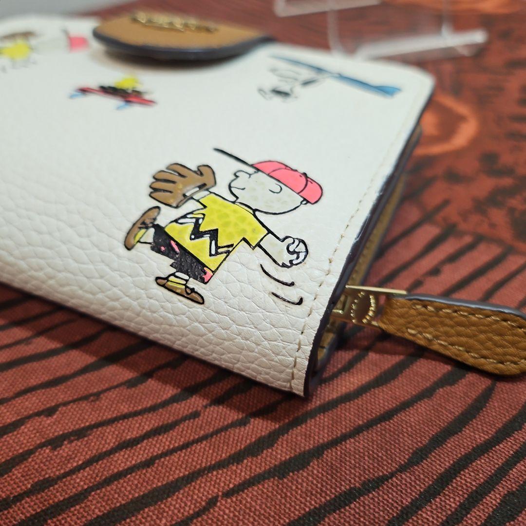 COACH コーチ 二つ折り 短財布 スヌーピー PEANUTS C4899