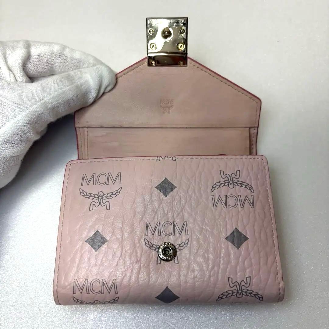 MCM 三つ折財布 ピンク ロゴ モノグラム コンパクト ミニ 金具
