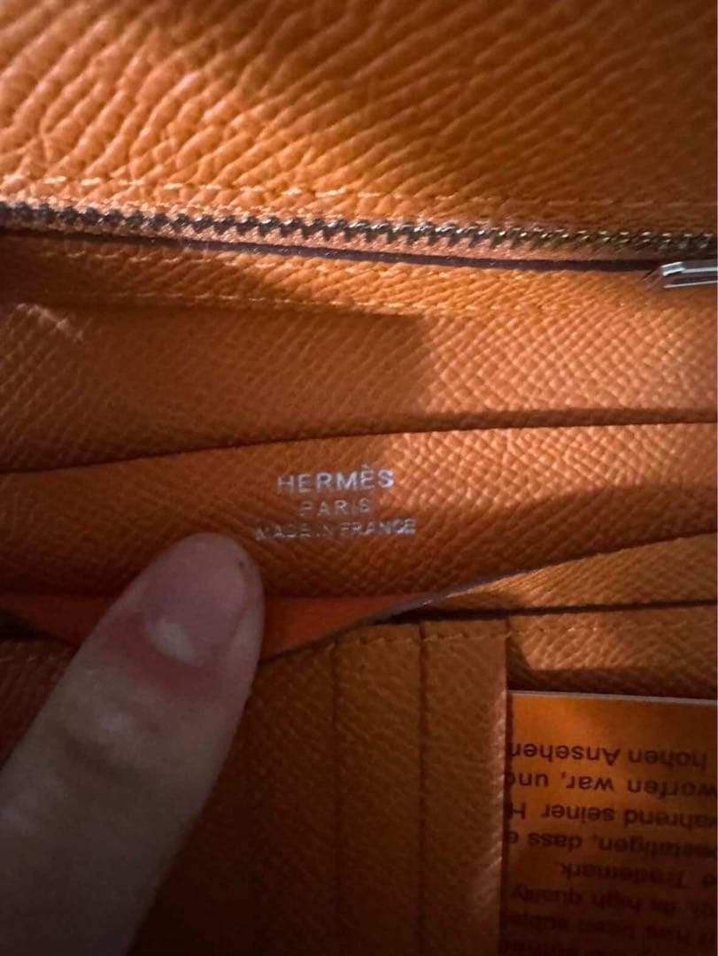 ア*ロ様 HERMES オレンジ 二つ折り財布
