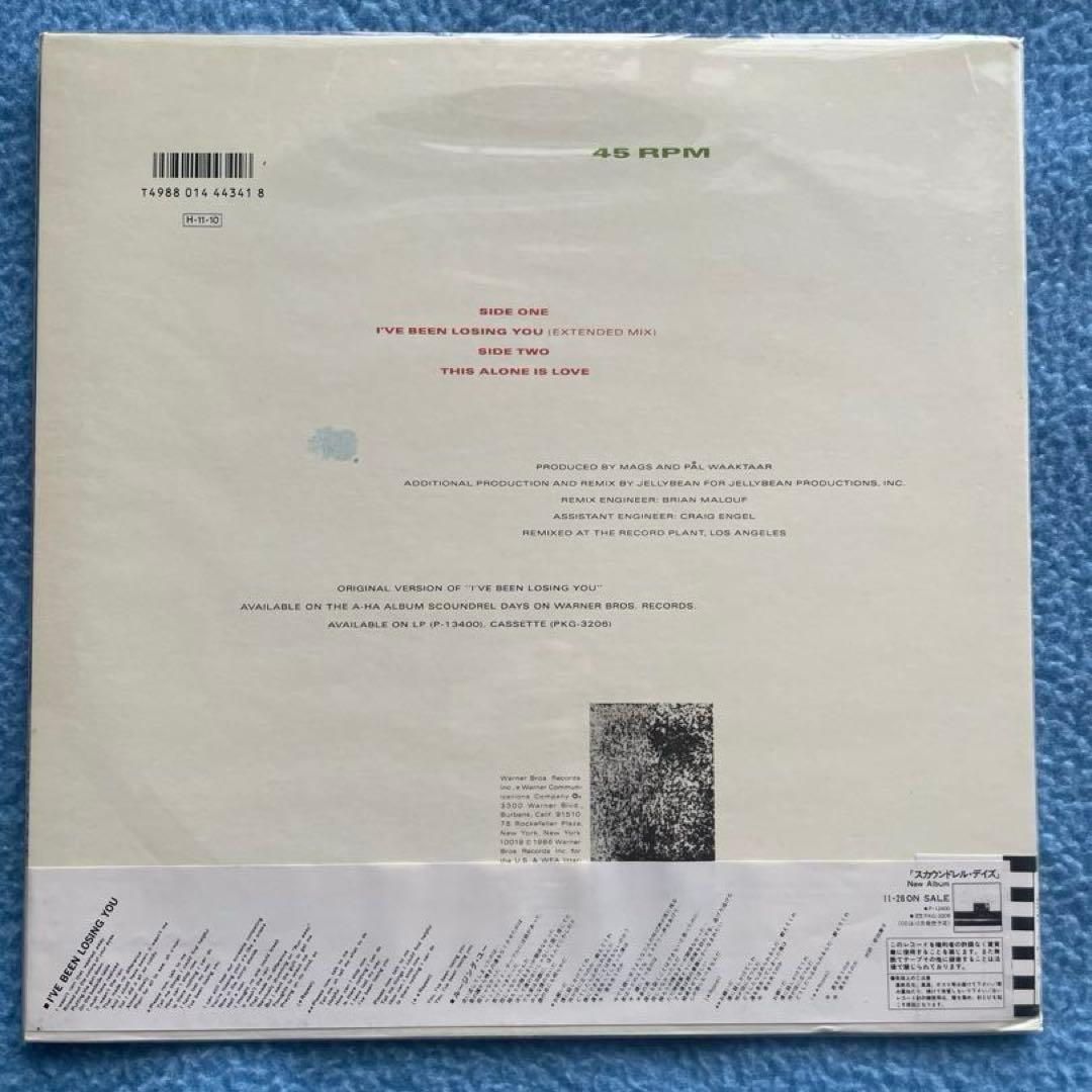 a-ha「ハンティング・ハイ・アンド・ロウ」「ルージング・ユー」レコード2枚。