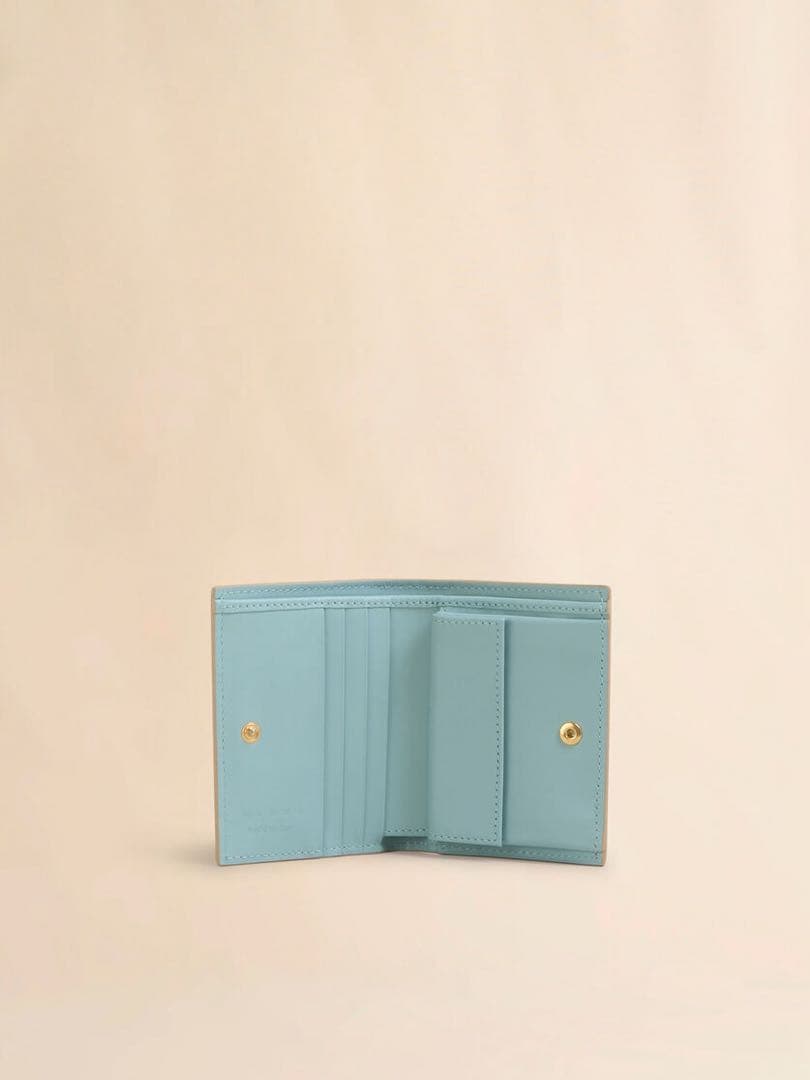mani ベージュ 二つ折り財布　マルニシンボル