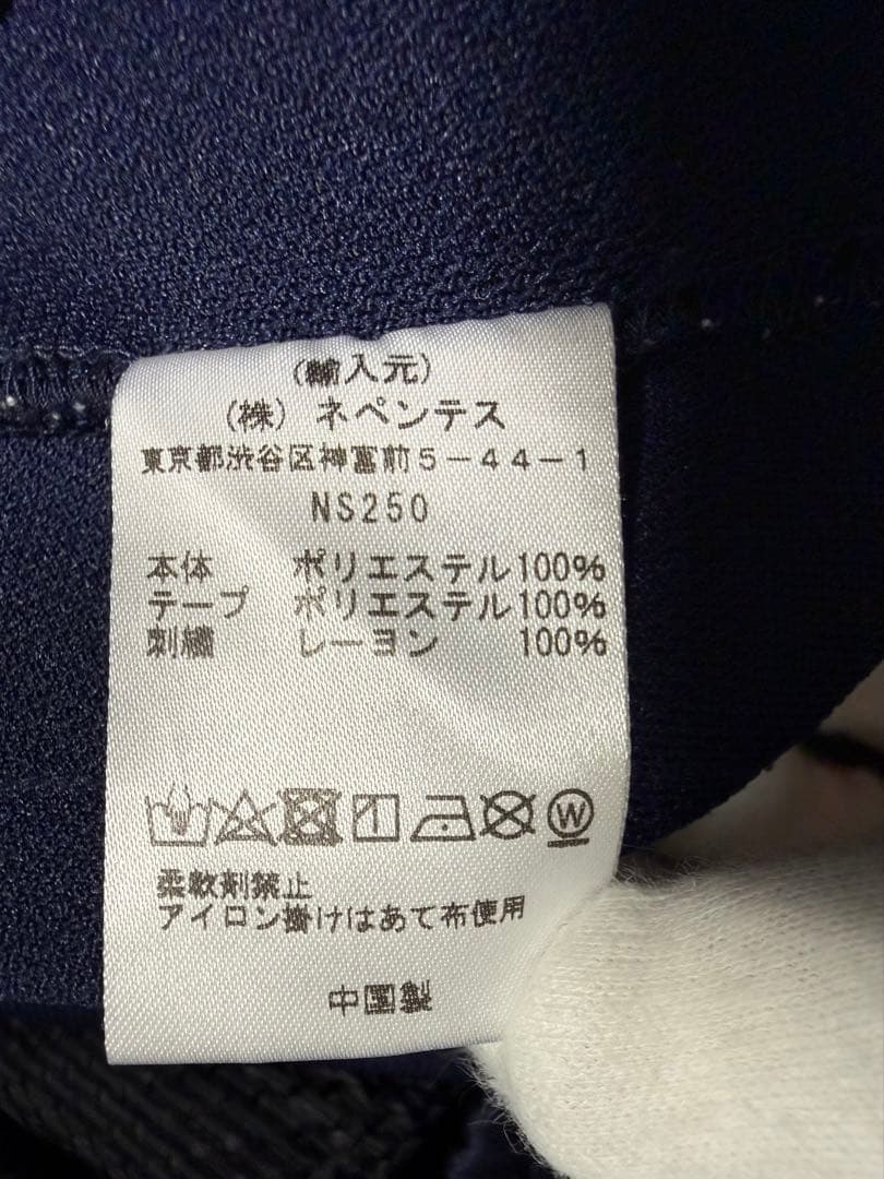 〈ニードルズ〉　ヒザデル トラックパンツ