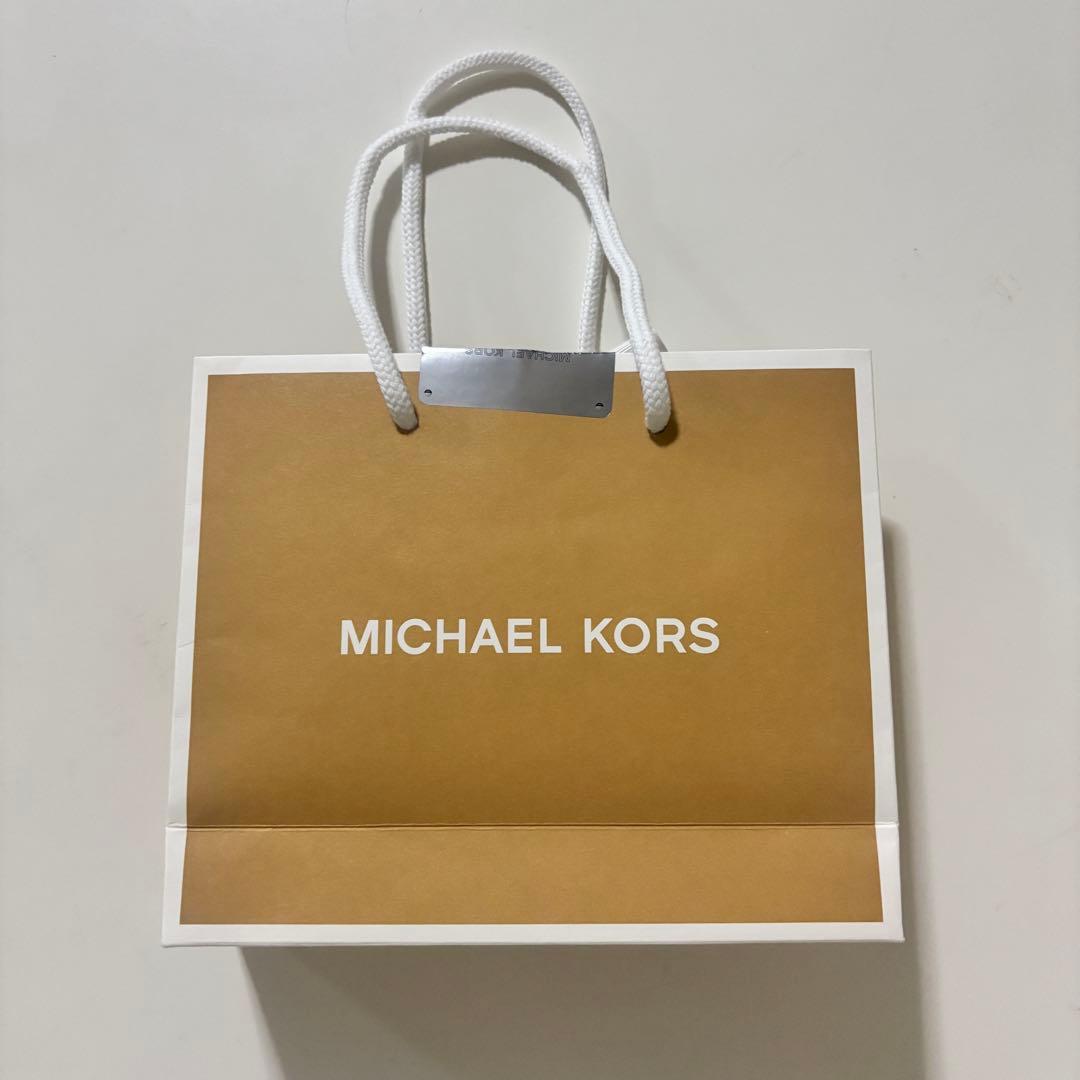 新品　MICHAEL KORS モノグラム三つ折り財布