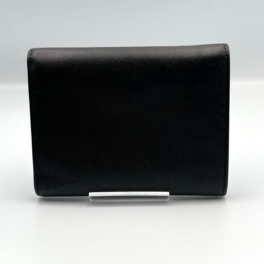 美品✨PRADA 三つ折り財布 黒　サフィアーノレザー　三角　トライアングル