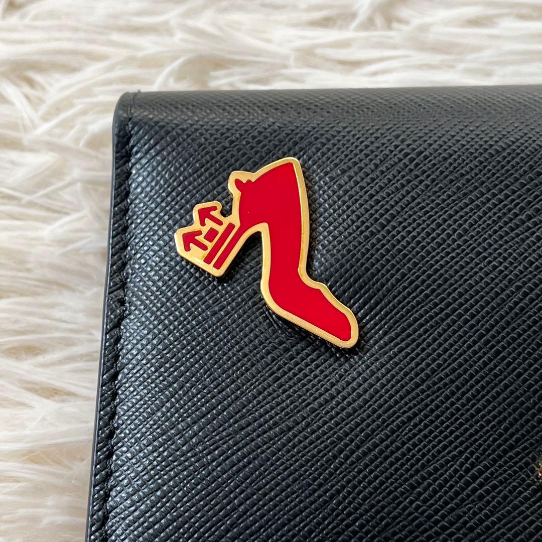 美品✨PRADA プラダ　二つ折り財布　サフィアーノ　ブラック　1mv204