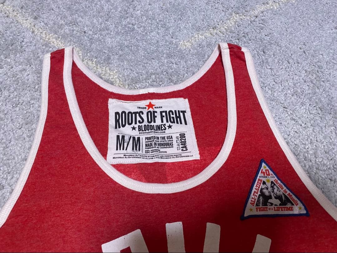 トップス Roots of Fight Thrilla Anniversary Tank