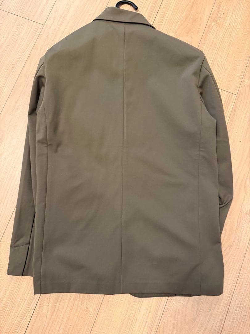 値下美品カーキセットアップNew Balance/MET24 スリムテーパー