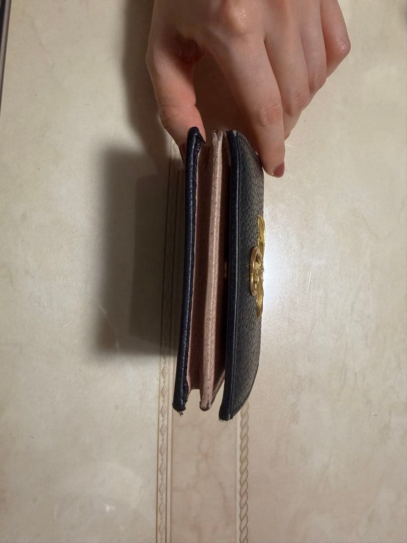 GUCCI 二つ折り財布 黒 リボンモチーフ