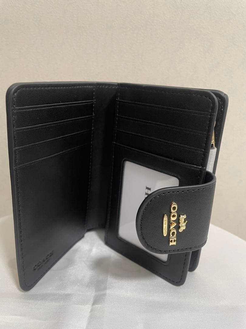 コーチ　レディース　折財布　カキー　小銭入れあり　新品　未使用