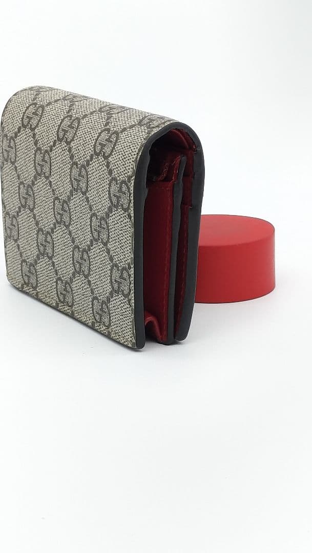 （美品）GUCCI 二つ折り財布GGスプリームベージュハイビスカスレッド箱袋付き