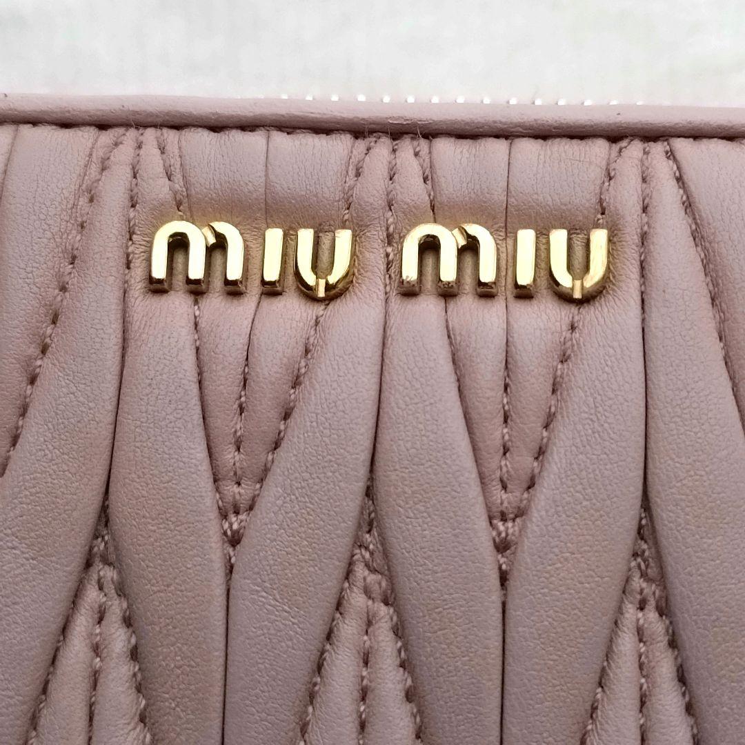 MIUMIU マテラッセ コンパクトウォレットゴールドロゴ ピンク