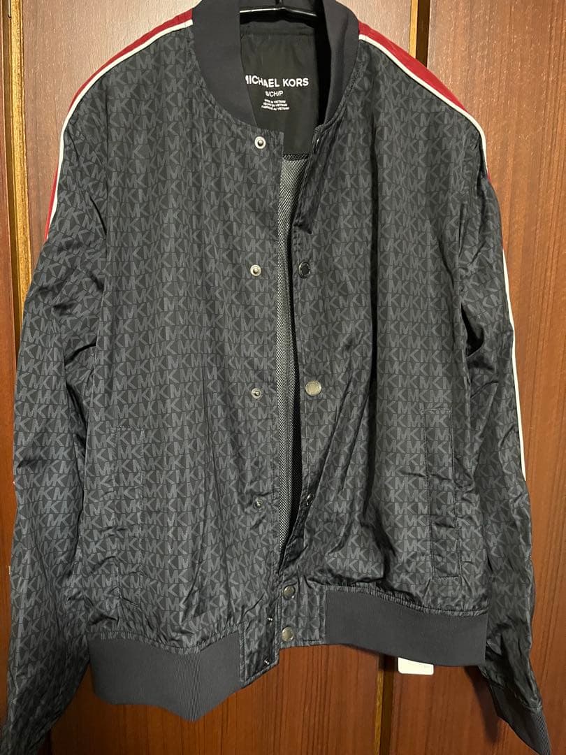 正規品マイケルコース 柄ブルゾン袖ライン　大きめ 定価¥81,400 未使用 黒