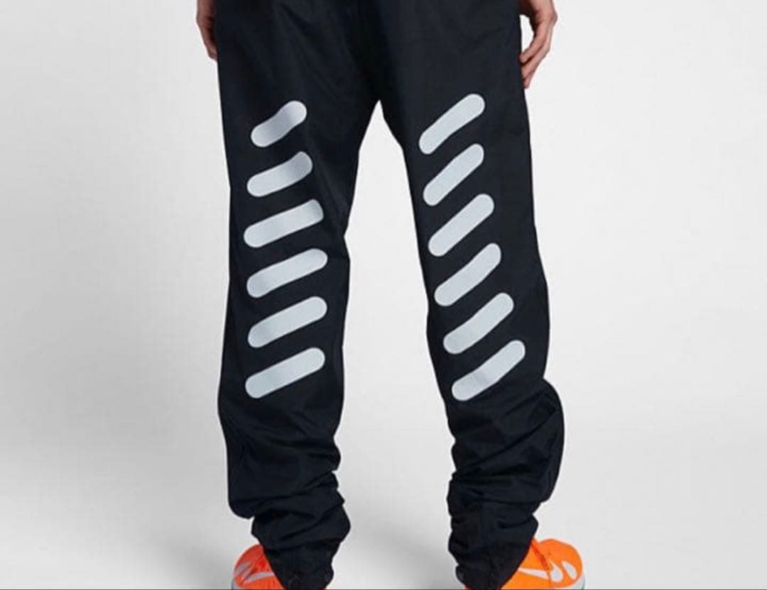 NIKE off-white トラックパンツ