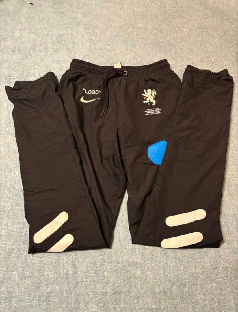 NIKE off-white トラックパンツ