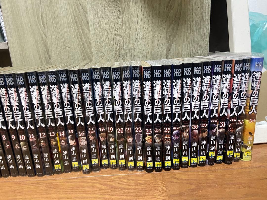 進撃の巨人全巻＋公式ガイドブック3冊+アニメガイドブック1冊+悔いなき選択2巻