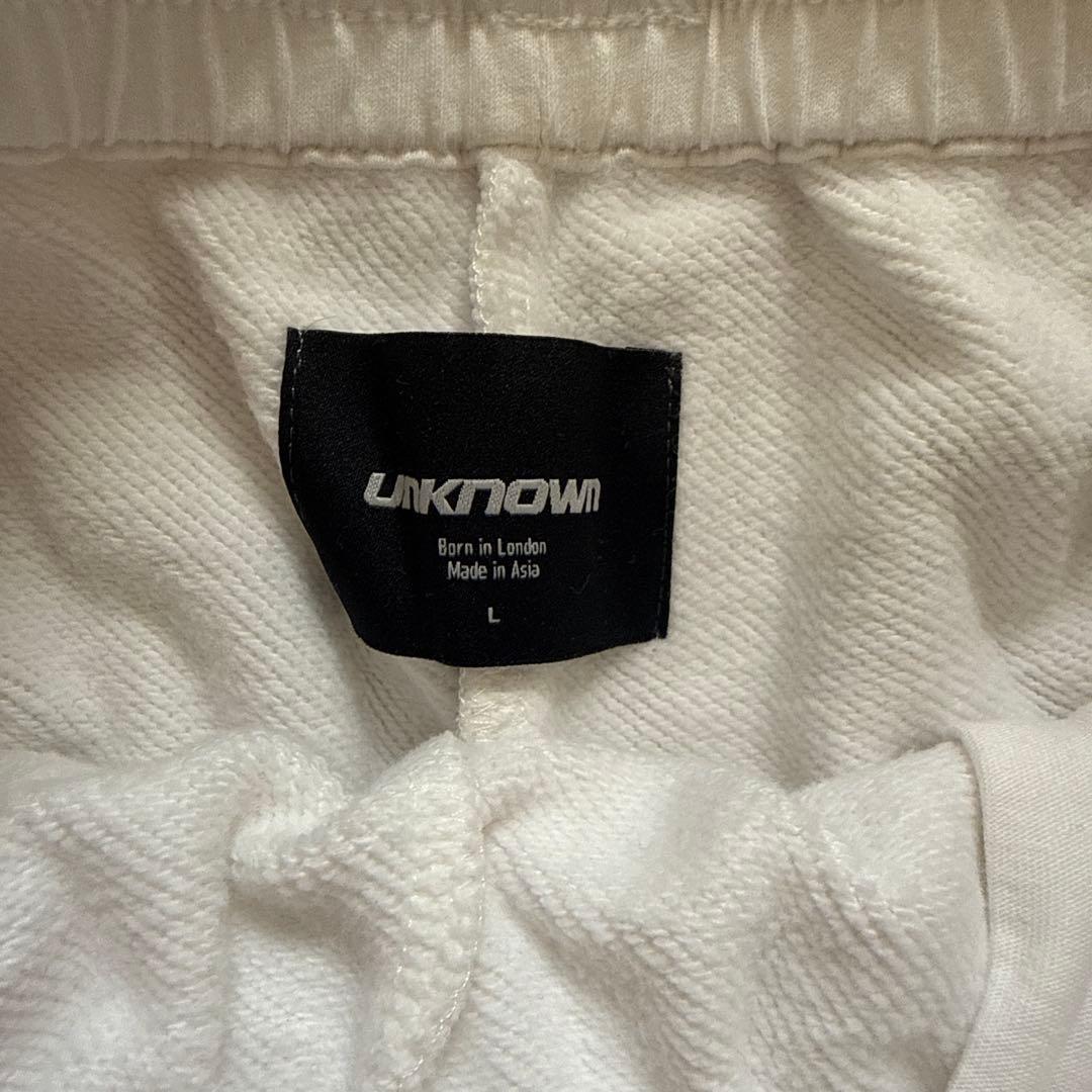 【UNKNOWN LONDON】クロスラインストーンジョガー