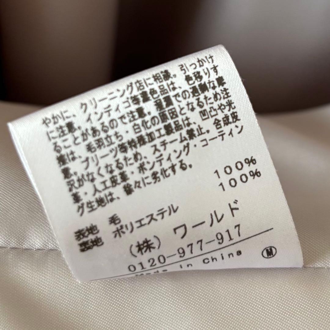 UNTITLED シャーフビーバーノーカラーコート ロングコート