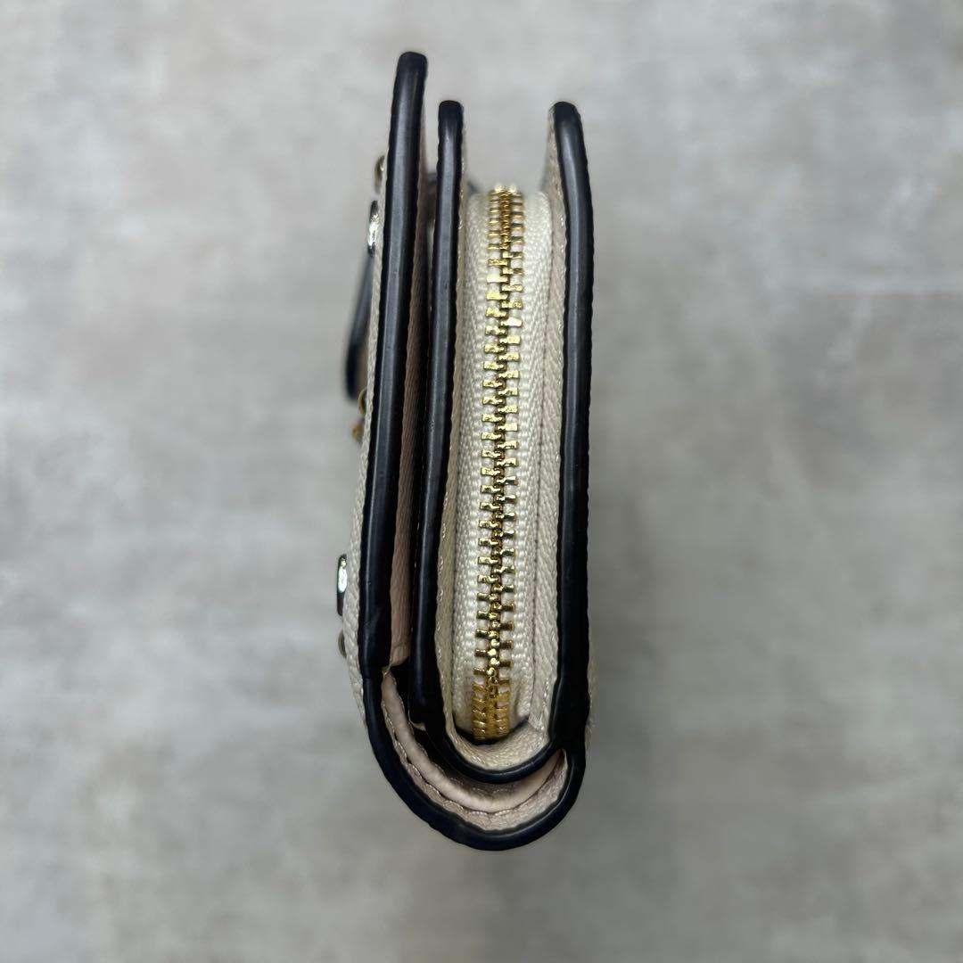 新品同様✨COACH 花柄装飾 二つ折り財布