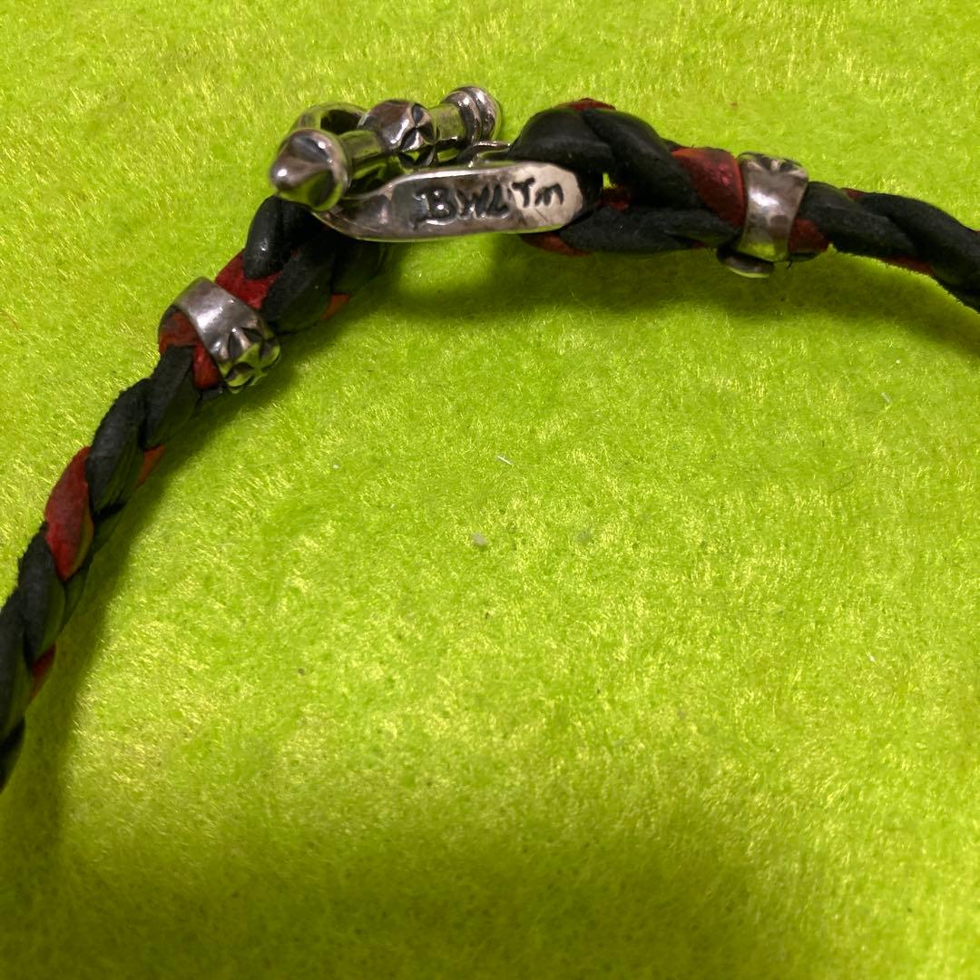 ビルウォールレザー　黒赤 編み革紐　スカルトップ