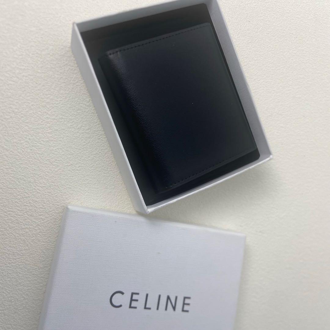 【CELINE】ネイビーのレザー製三つ折り財布 ゴールド金具付き