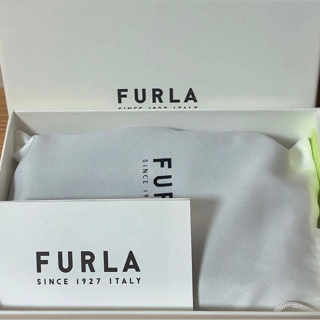 【ちゃあ】FURLA二つ折り財布・カメリアS・ネイビー/グレージュ