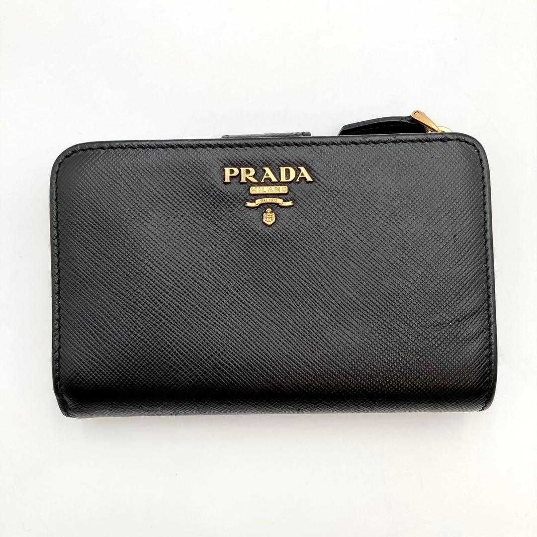 ゆみ✨ PRADA 1ML225 二つ折り財布 レザー 黒 メタルロゴ