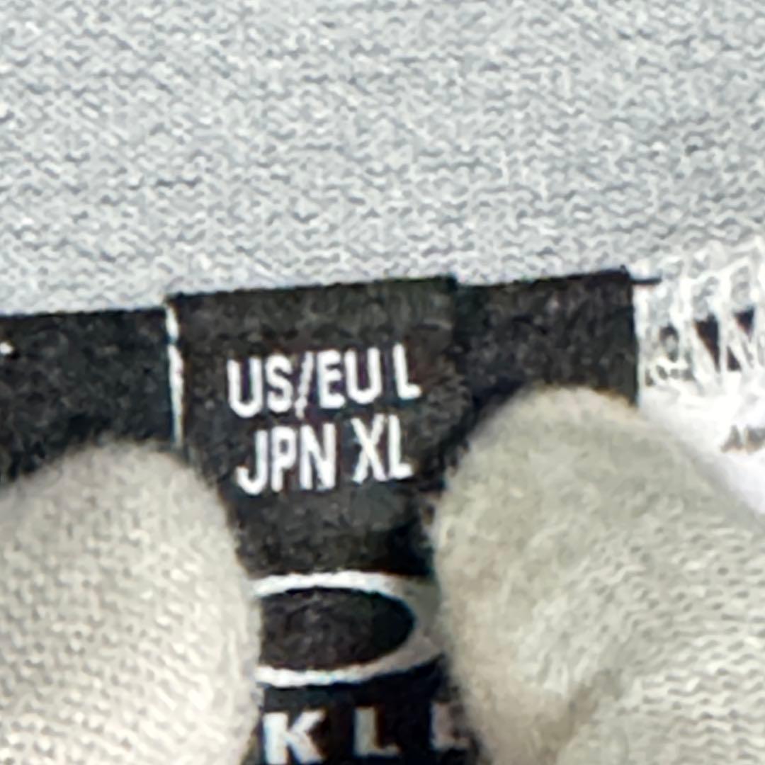 Oakley オークリー　モックネックシャツ　ホワイト　幾何学総柄ポリXL長袖