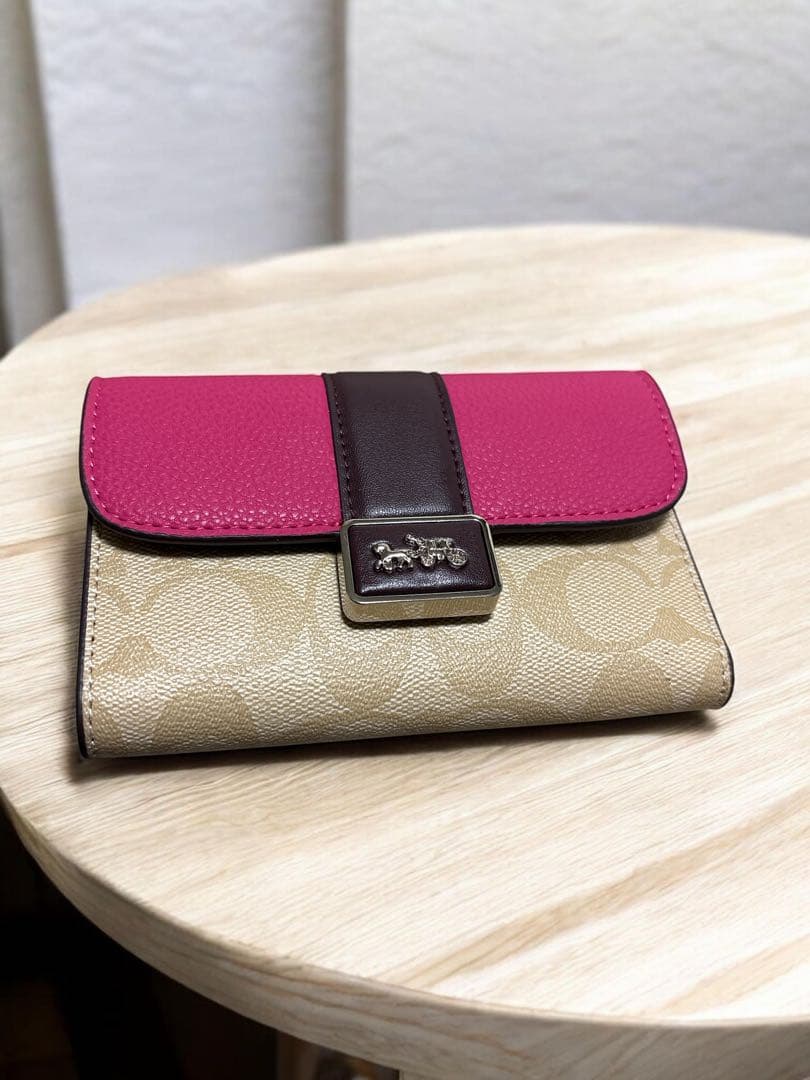 《新品》COACH 二つ折り財布ピンク/ベージュ新品