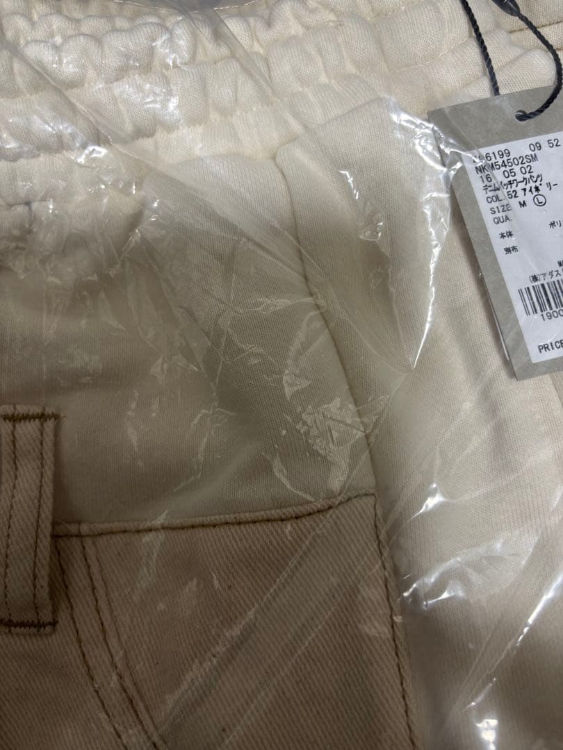 ニコアンド[MODENORMCORE]デニムパッチワークパンツアイボリーL新品