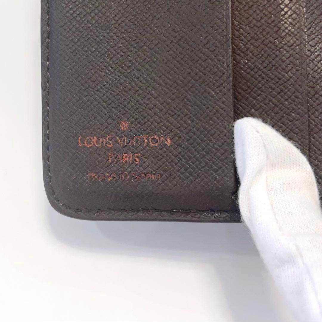 ルイヴィトン ダミエ ラウンドジップ エベヌ 折り財布 茶 革 N61668