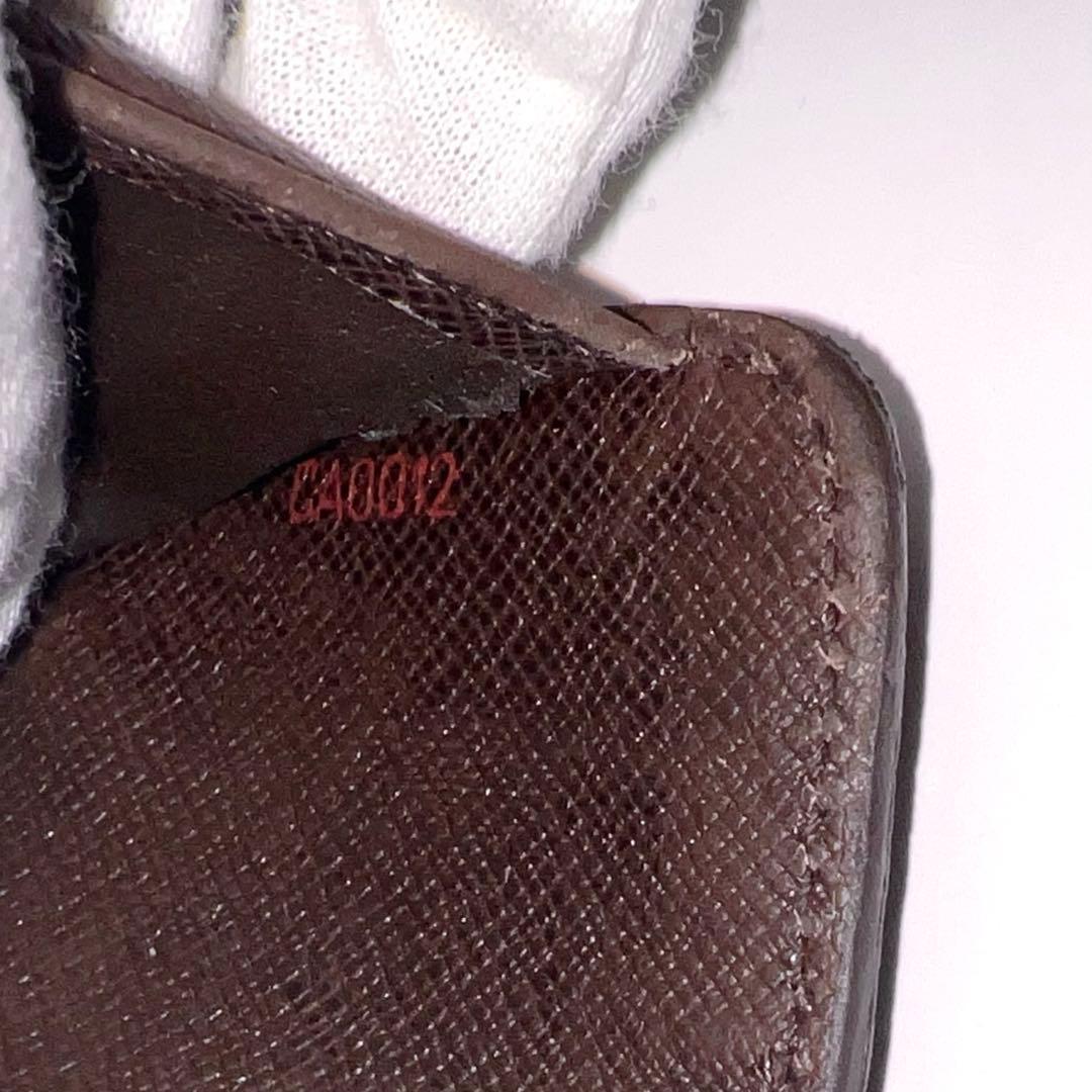 ルイヴィトン ダミエ ラウンドジップ エベヌ 折り財布 茶 革 N61668