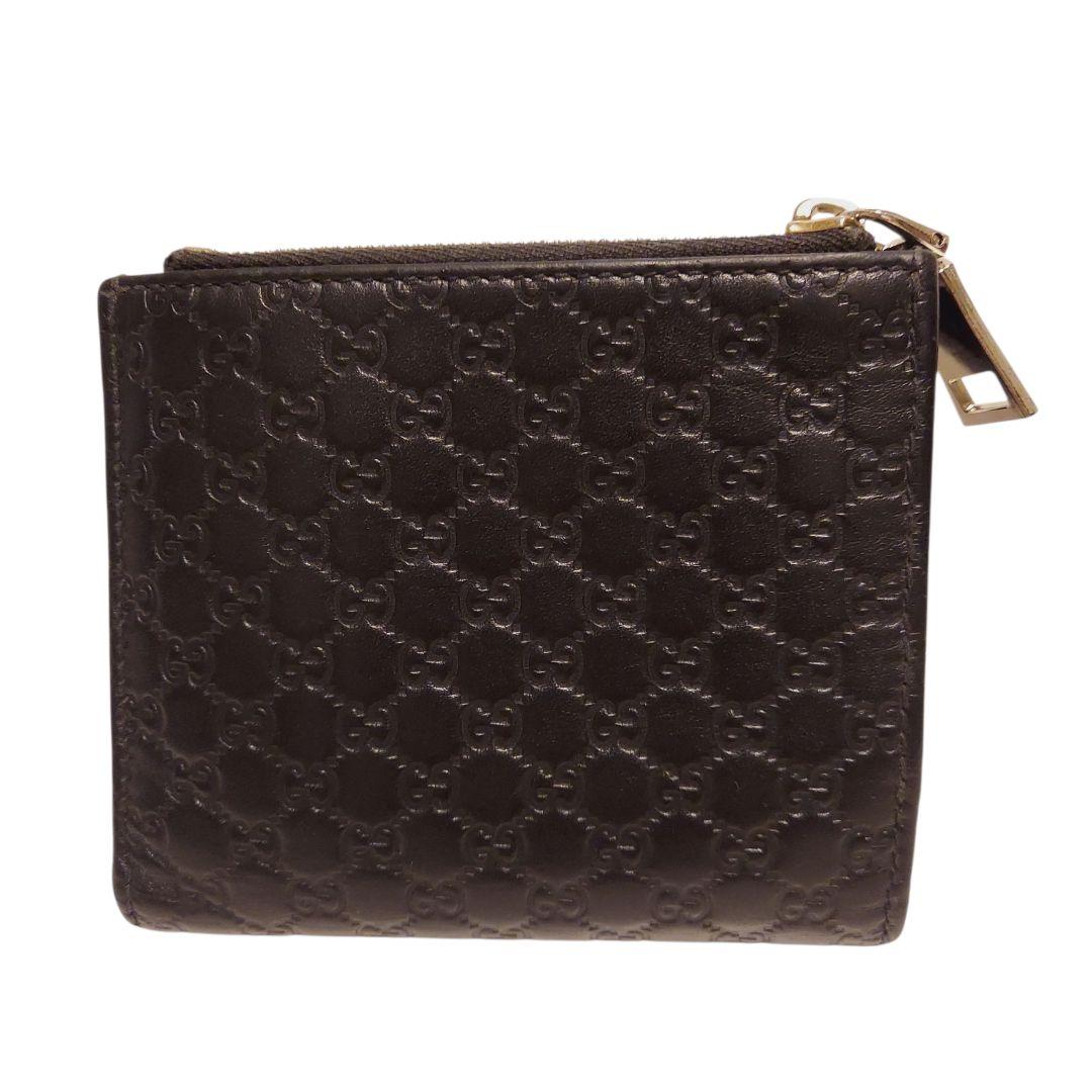 【GUCCI】2つ折り財布 黒 マイクロ レザー 型押し