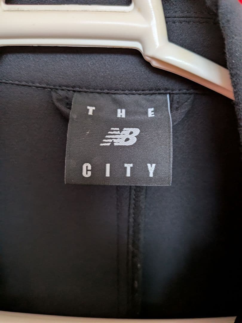 ニューバランスTheCityスーツセットアップ