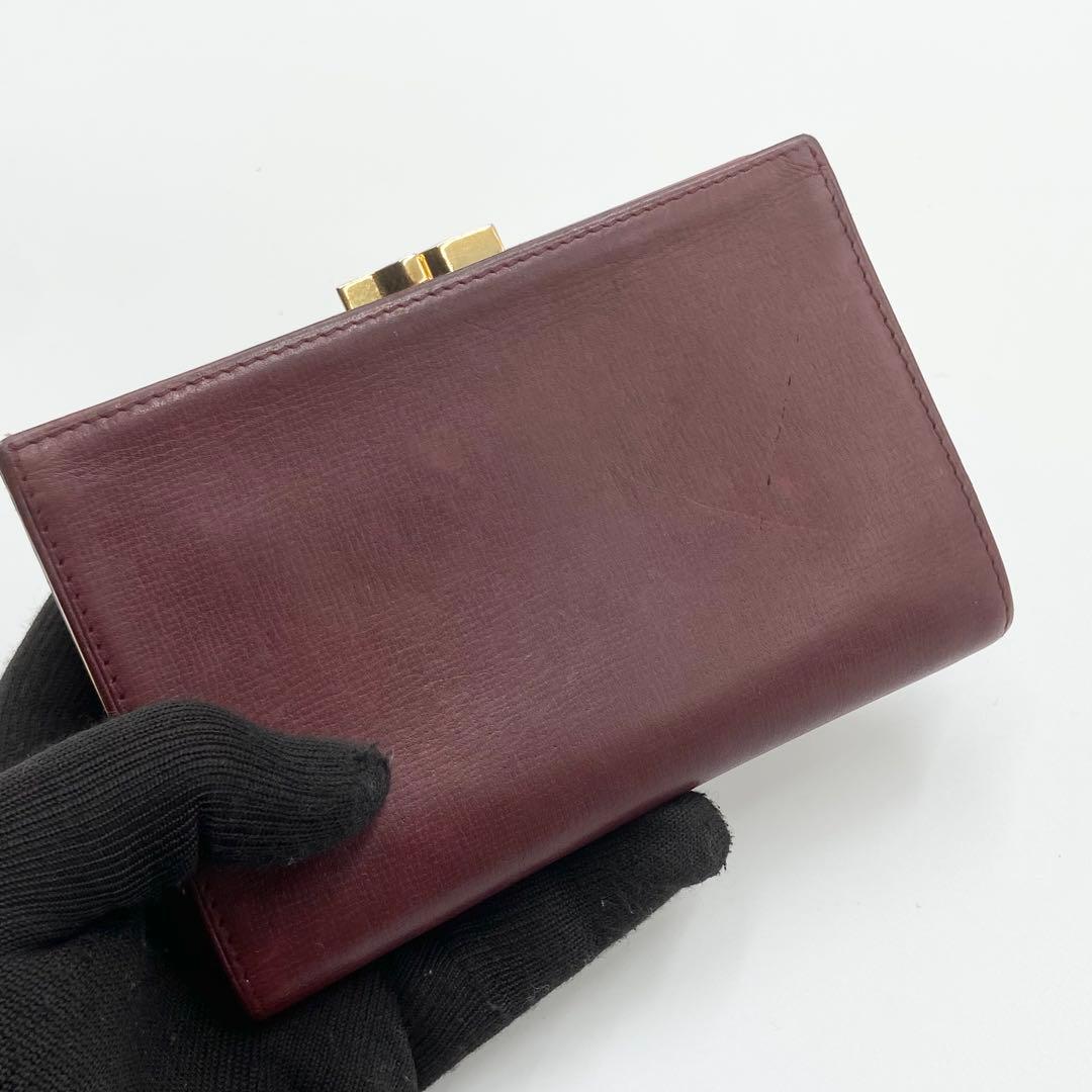 カルティエ　折り財布　がま口　ゴールド金具　マストライン　レザー　ボルドー