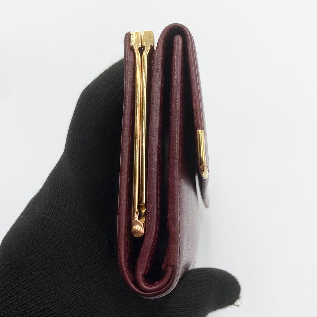 カルティエ　折り財布　がま口　ゴールド金具　マストライン　レザー　ボルドー