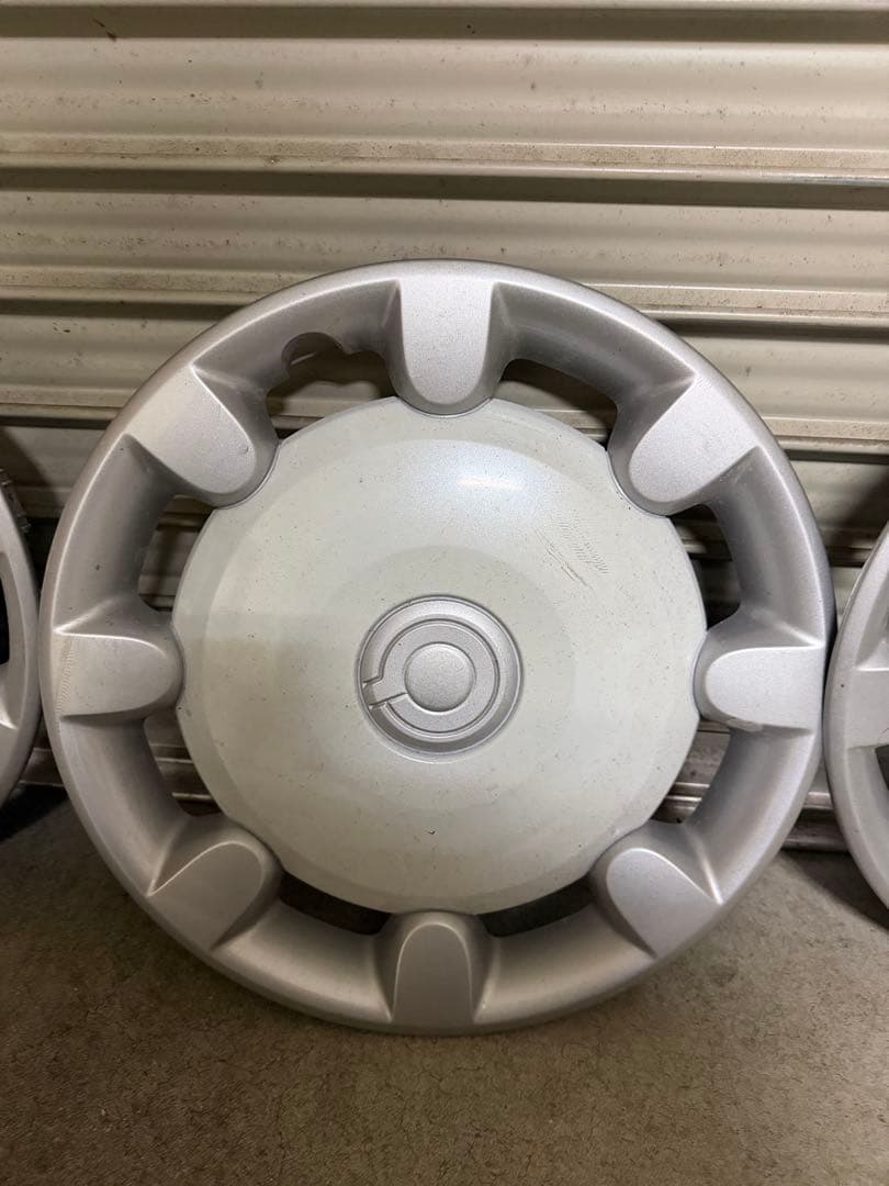 ムーブキャンバス純正ホイールキャップ新車外し中古品傷汚れ有り。４枚セット