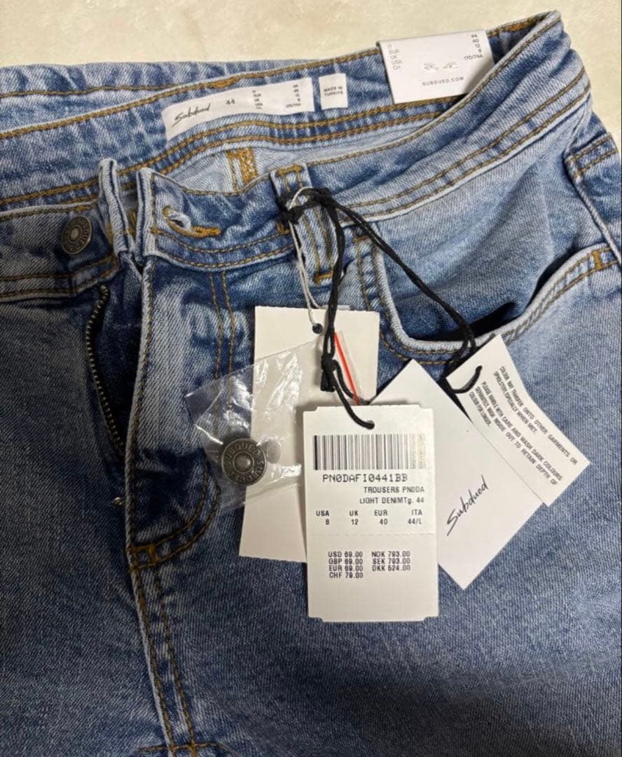 パンツ subdued Ripped flare jeans