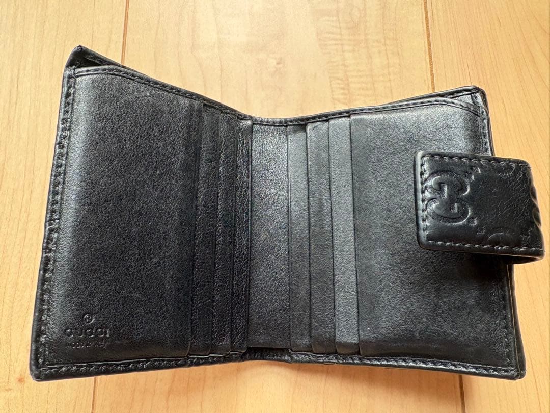 GUCCI ブラックレザー 二つ折り財布 GGシマ