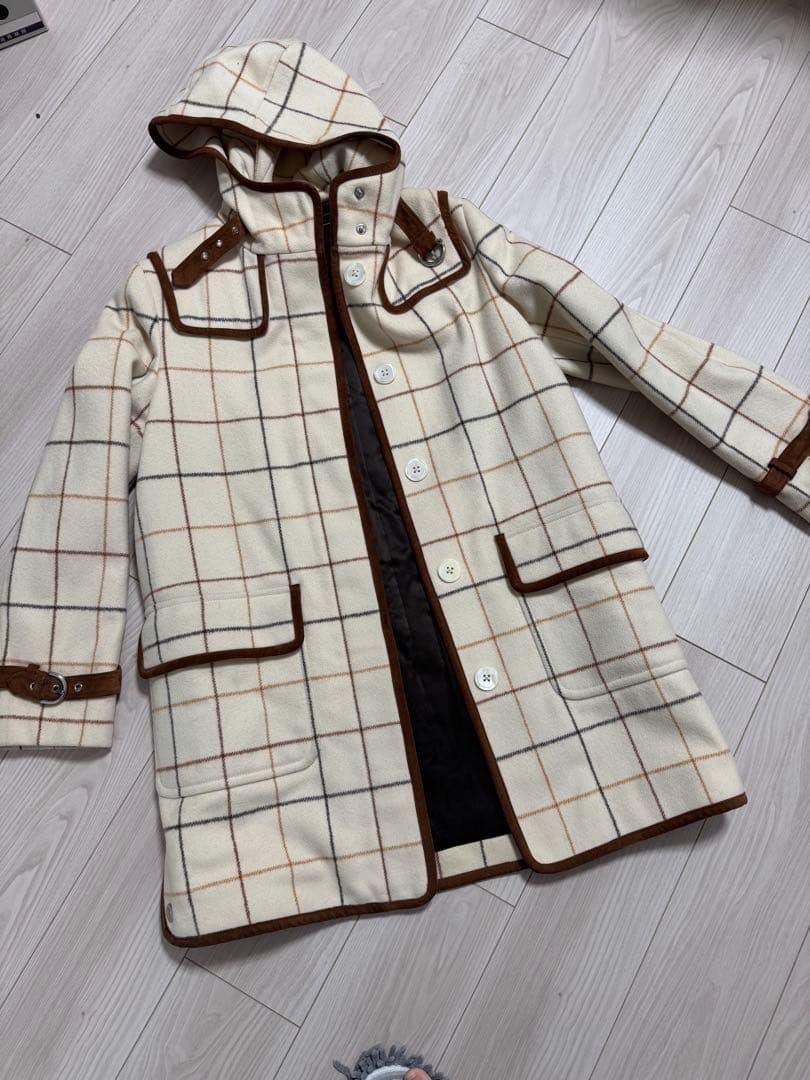 coachコーチのコート
