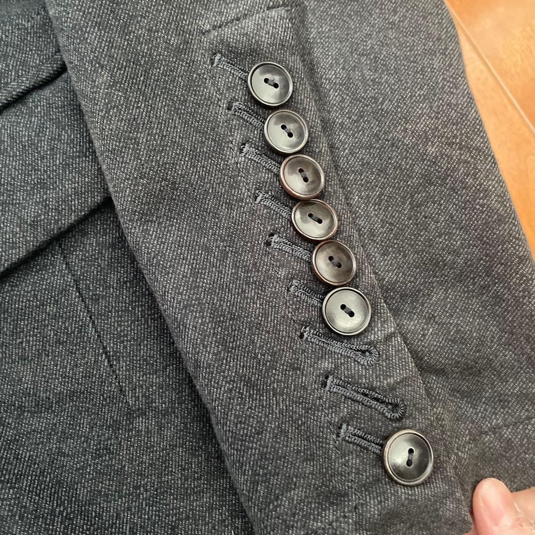 音符刺繍の黒テーラードジャケット